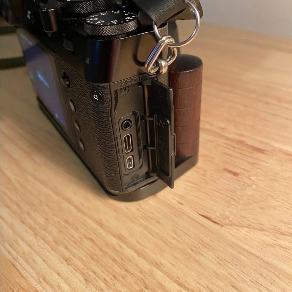 Fujifilm Black Camera with Olive Strap